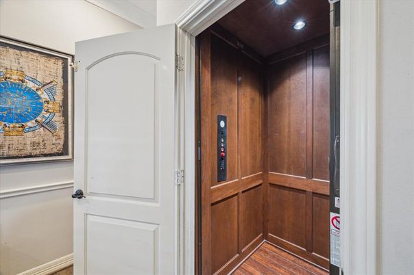 Elevator, Interior, Recessed Lighting, Wood Texture Flooring, Wooden Walls