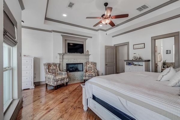 Bedroom, Fireplace, Interior, Recessed Lighting, Wood Texture Flooring