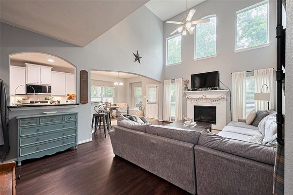 Dining room, Fireplace, Interior, Kitchen, Living room, Pendant Lights, Recessed Lighting, Stainless Steel Appliances, Wood Texture Flooring
