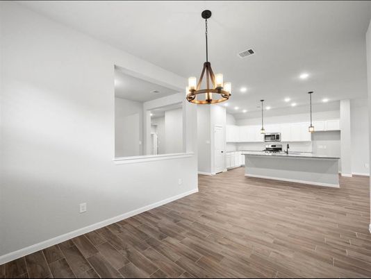 Chandelier, Interior, Kitchen, Pendant Lights, Recessed Lighting, Stainless Steel Appliances, Wood Texture Flooring