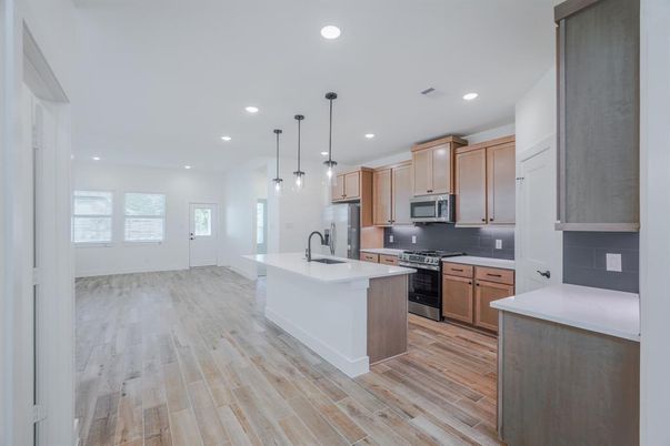 Interior, Kitchen, Pendant Lights, Recessed Lighting, Stainless Steel Appliances, Wood Texture Flooring