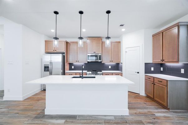 Interior, Kitchen, Pendant Lights, Recessed Lighting, Stainless Steel Appliances, Wood Texture Flooring