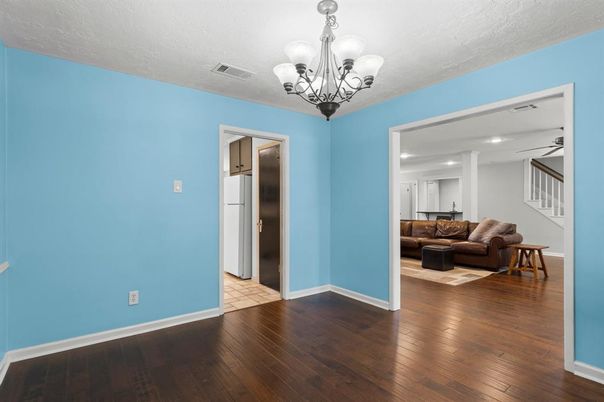 Chandelier, Empty room, Interior, Living room, Recessed Lighting, Wood Texture Flooring