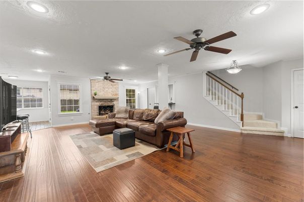 Fireplace, Interior, Living room, Recessed Lighting, Wood Texture Flooring