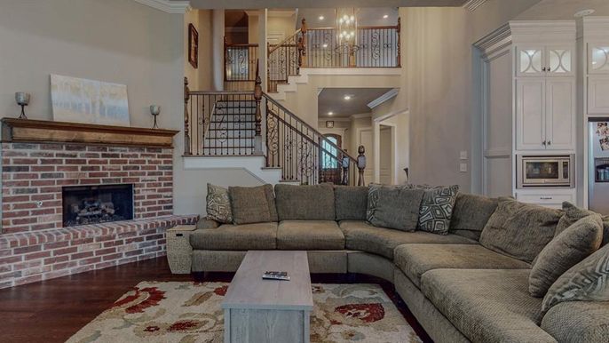 Fireplace, Interior, Living room, Recessed Lighting, Stone Walls, Wood Texture Flooring