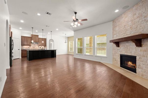 Fireplace, Interior, Kitchen, Pendant Lights, Recessed Lighting, Stone Walls, Wood Texture Flooring