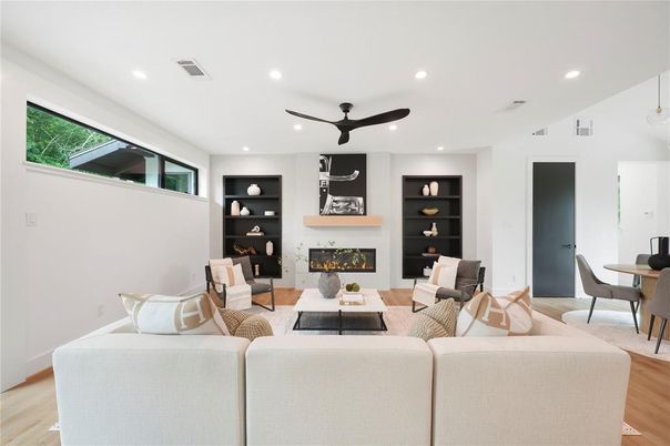 Dining room, Fireplace, Interior, Living room, Pendant Lights, Recessed Lighting, Wood Texture Flooring