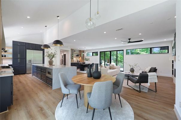 Dining room, Interior, Kitchen, Living room, Pendant Lights, Recessed Lighting, Stainless Steel Appliances, Wood Texture Flooring