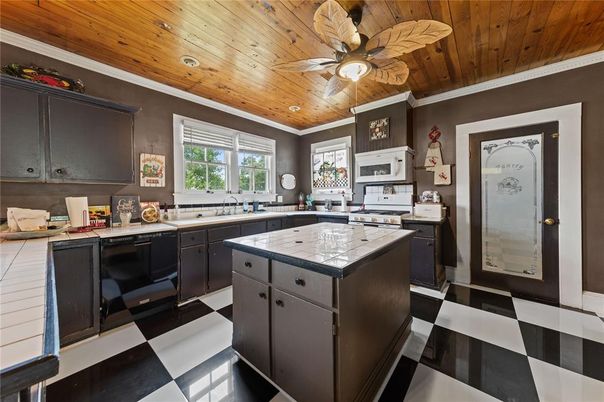 Interior, Kitchen, Recessed Lighting, Tile Countertops, Wooden Ceilings