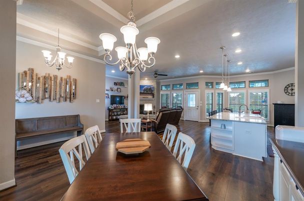 Chandelier, Dining room, Interior, Kitchen, Living room, Pendant Lights, Recessed Lighting, Wood Texture Flooring