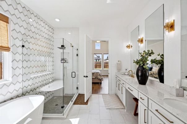 Bathroom, Dual Sink Vanities, Free Standing Baths, Glass Shower, Interior, Marble, Recessed Lighting, Wood Texture Flooring