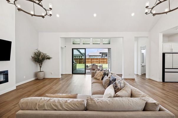 Chandelier, Fireplace, Interior, Living room, Recessed Lighting, Wood Texture Flooring