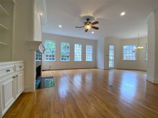 Chandelier, Empty room, Fireplace, Interior, Recessed Lighting, Wood Texture Flooring