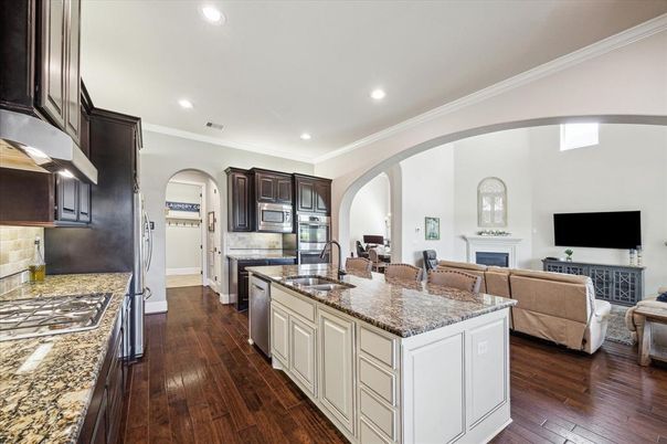 Fireplace, Interior, Kitchen, Living room, Recessed Lighting, Stainless Steel Appliances, Wood Texture Flooring