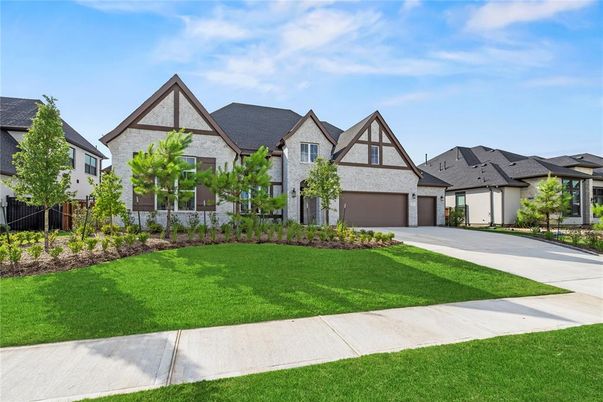 Attached, Exterior, Facade, Tudor Revival