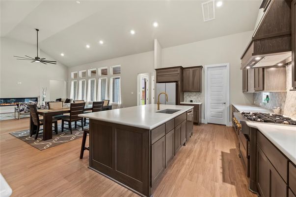 Dining room, Interior, Kitchen, Pendant Lights, Recessed Lighting, Stainless Steel Appliances, Wood Texture Flooring