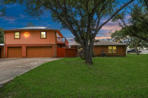 Attached, Backyard, Exterior, Facade, Brick Facade, Solar Panels, Split Level