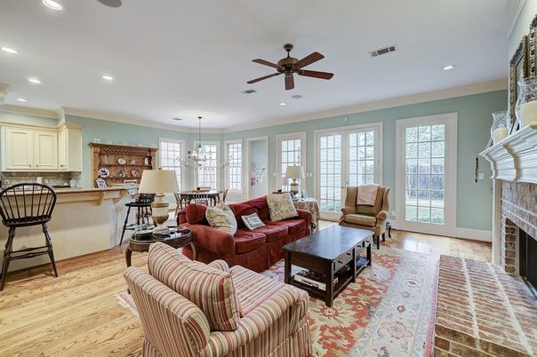 Dining room, Fireplace, Interior, Living room, Pendant Lights, Recessed Lighting, Wood Texture Flooring
