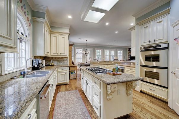 Chandelier, Interior, Kitchen, Pendant Lights, Recessed Lighting, Stainless Steel Appliances, Wood Texture Flooring