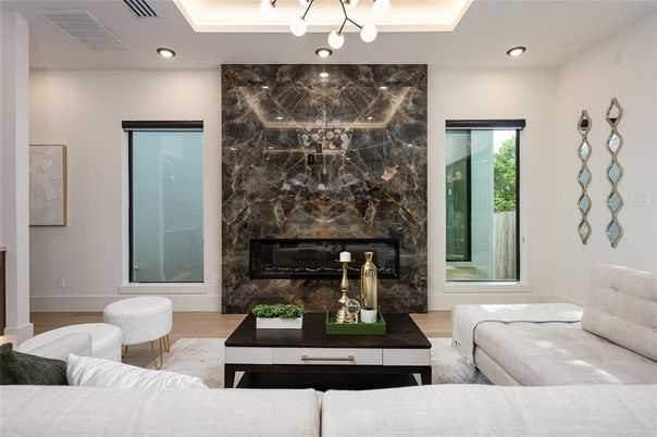 Fireplace, Interior, Living room, Marble Walls, Recessed Lighting, Wood Texture Flooring