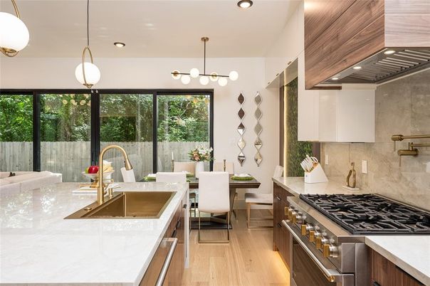 Dining room, Interior, Kitchen, Pendant Lights, Recessed Lighting, Stainless Steel Appliances, Wood Texture Flooring