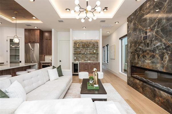 Fireplace, Interior, Kitchen, Living room, Marble Walls, Pendant Lights, Recessed Lighting, Stainless Steel Appliances, Wood Texture Flooring
