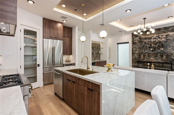 Fireplace, Interior, Kitchen, Pendant Lights, Recessed Lighting, Stainless Steel Appliances, Wood Texture Flooring