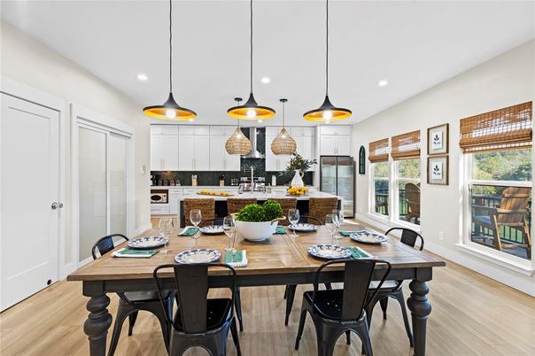 Dining room, Interior, Kitchen, Pendant Lights, Recessed Lighting, Stainless Steel Appliances, Wood Texture Flooring