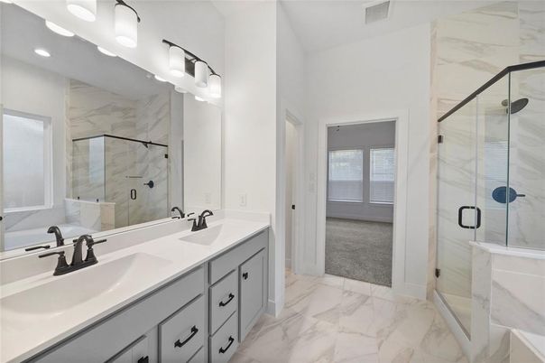 Bathroom, Dual Sink Vanities, Glass Shower, Interior, Marble, Marble Walls, Recessed Lighting