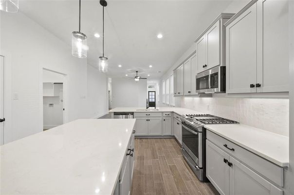 Interior, Kitchen, Pendant Lights, Recessed Lighting, Stainless Steel Appliances, Wood Texture Flooring