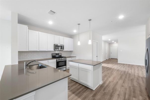 Interior, Kitchen, Pendant Lights, Recessed Lighting, Stainless Steel Appliances, Wood Texture Flooring