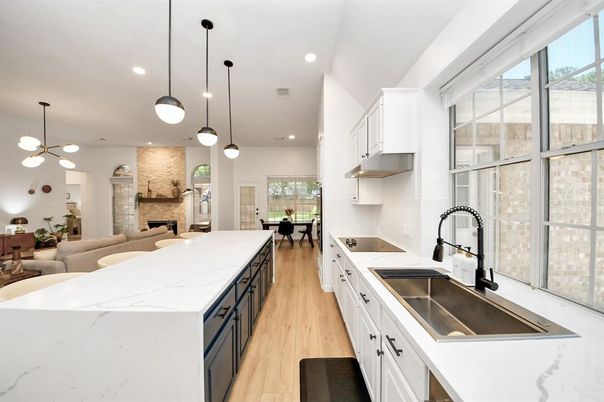 Dining room, Fireplace, Interior, Kitchen, Living room, Pendant Lights, Recessed Lighting, Stone Walls, Wood Texture Flooring