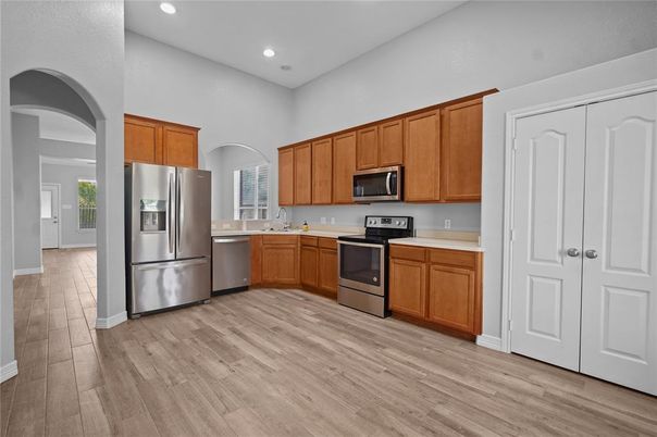 Interior, Kitchen, Recessed Lighting, Stainless Steel Appliances, Wood Texture Flooring