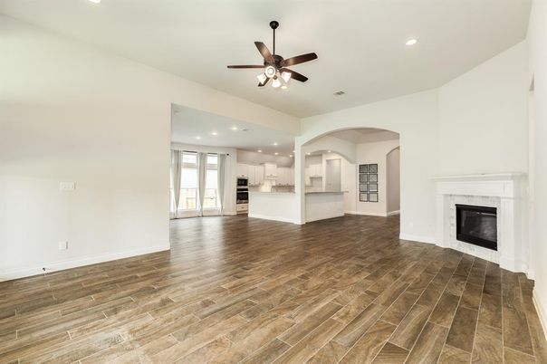 Empty room, Fireplace, Interior, Kitchen, Recessed Lighting, Wood Texture Flooring