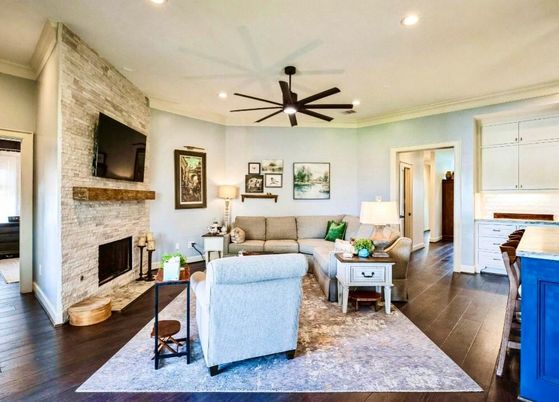 Fireplace, Interior, Living room, Recessed Lighting, Stone Walls, Wood Texture Flooring