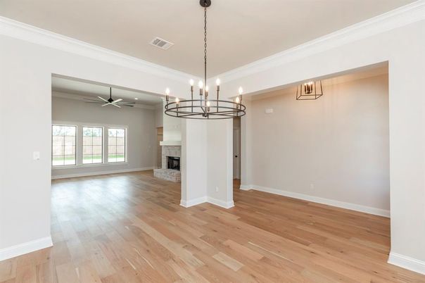 Chandelier, Empty room, Fireplace, Interior, Pendant Lights, Wood Texture Flooring