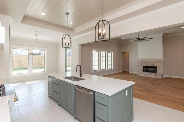 Fireplace, Interior, Kitchen, Pendant Lights, Recessed Lighting, Stainless Steel Appliances, Wood Texture Flooring