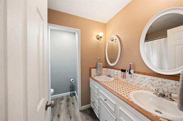 Bathroom, Dual Sink Vanities, Interior, Tile Countertops, Wood Texture Flooring