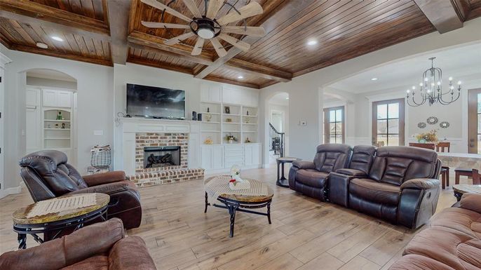 Chandelier, Fireplace, Interior, Living room, Recessed Lighting, Wooden Beams, Wooden Ceilings, Wood Texture Flooring