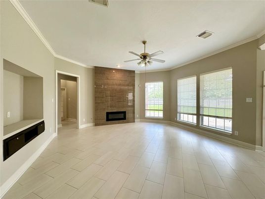 Empty room, Fireplace, Interior, Recessed Lighting, Stone Walls, Wood Texture Flooring