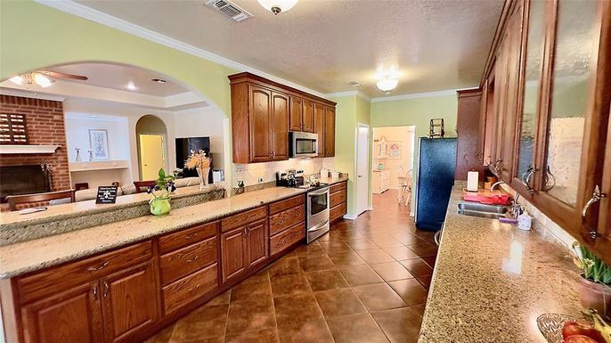 Fireplace, Interior, Kitchen, Recessed Lighting, Stone Walls