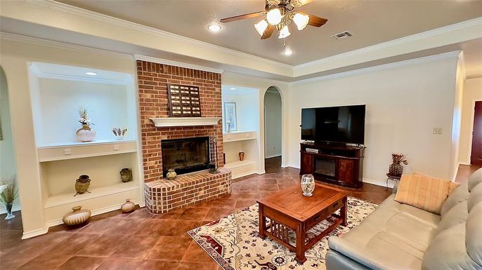 Fireplace, Interior, Living room, Recessed Lighting, Stone Walls, Wood Texture Flooring