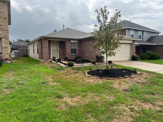 Attached, Backyard, Exterior, Facade, Brick Facade, Split Level