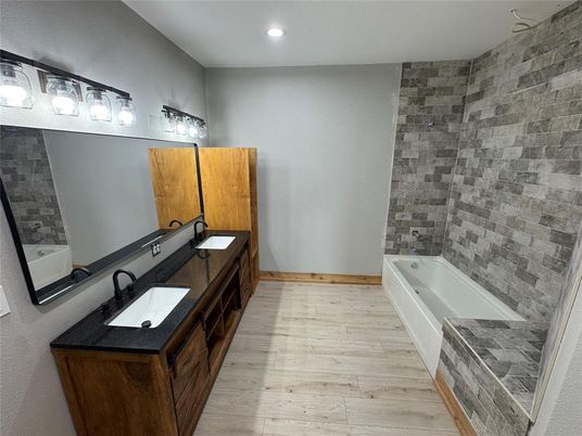 Bathroom, Dual Sink Vanities, Interior, Recessed Lighting, Wood Texture Flooring