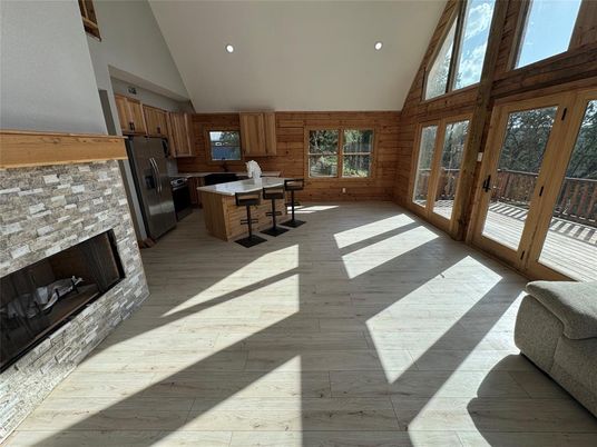 Fireplace, Interior, Kitchen, Recessed Lighting, Wood Texture Flooring, Wooden Walls