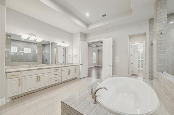 Bathroom, Dual Sink Vanities, Glass Shower, Interior, Recessed Lighting, Wood Texture Flooring