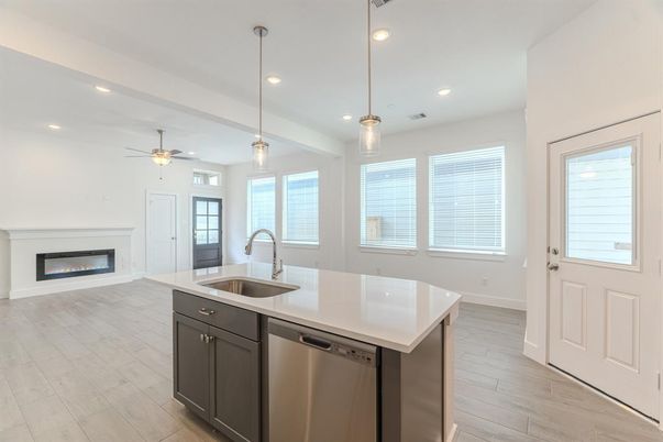 Fireplace, Interior, Kitchen, Pendant Lights, Recessed Lighting, Stainless Steel Appliances, Wood Texture Flooring
