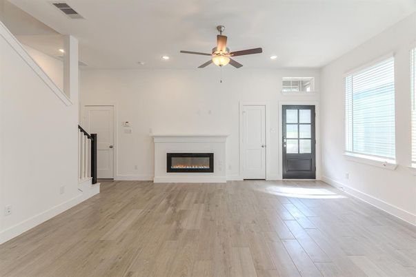 Empty room, Fireplace, Interior, Recessed Lighting, Wood Texture Flooring