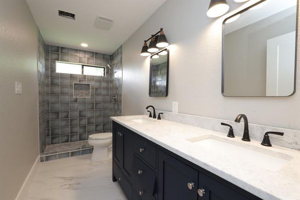Bathroom, Dual Sink Vanities, Glass Shower, Interior, Marble, Recessed Lighting
