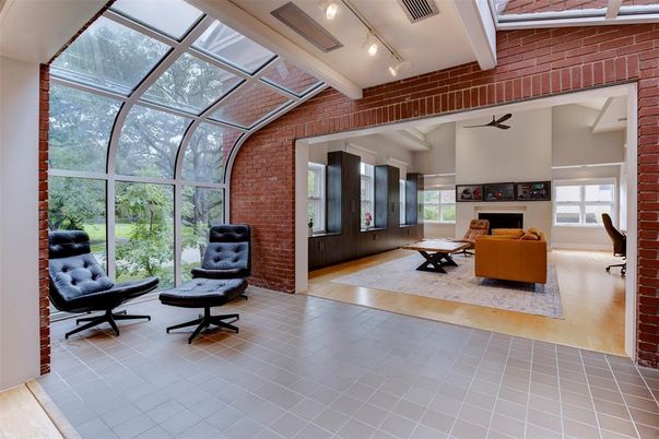Fireplace, Glass Ceilings, Interior, Stone Walls, Sun Room, Wood Texture Flooring